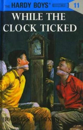 While the Clock Ticked (Hardy Boys, Book 11) - Hardcover - GOOD